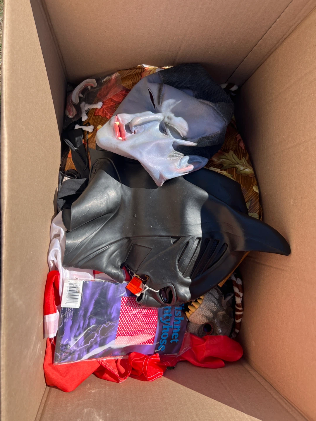 Assorted Halloween Costume Masks and Accessories
