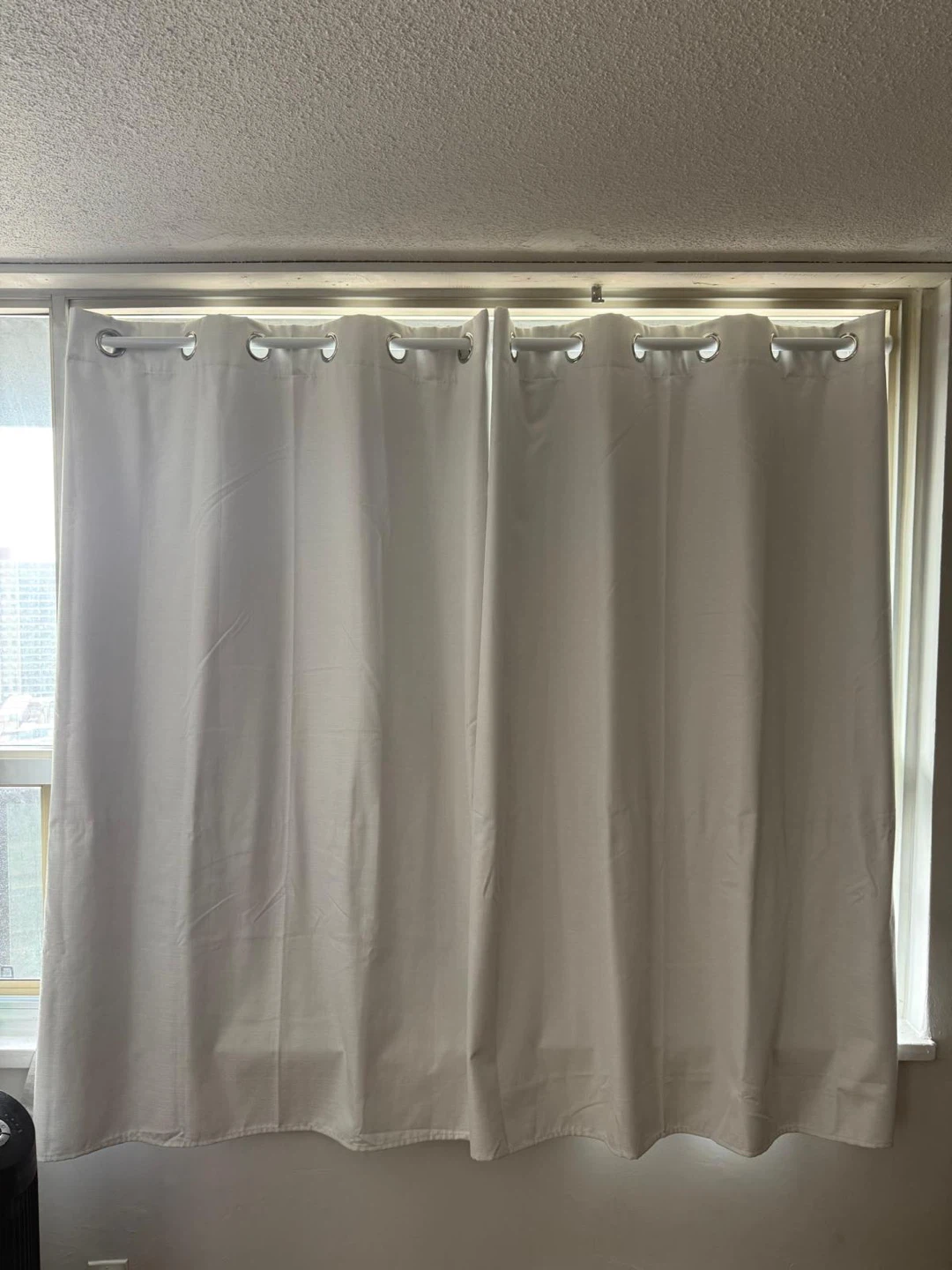 Pair of White Grommet Curtains with metal adjustable rod