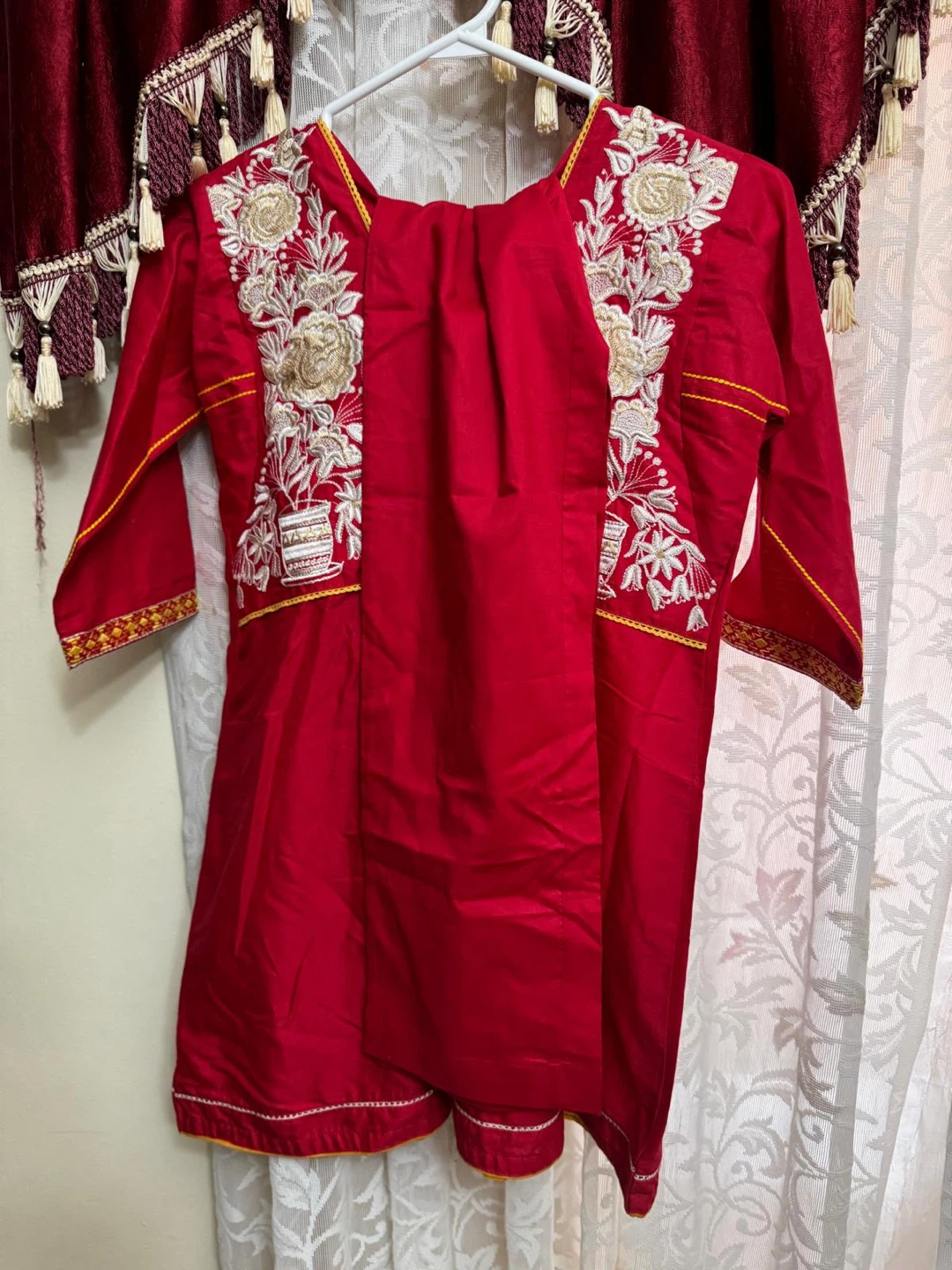 Red embroidered traditional outfit