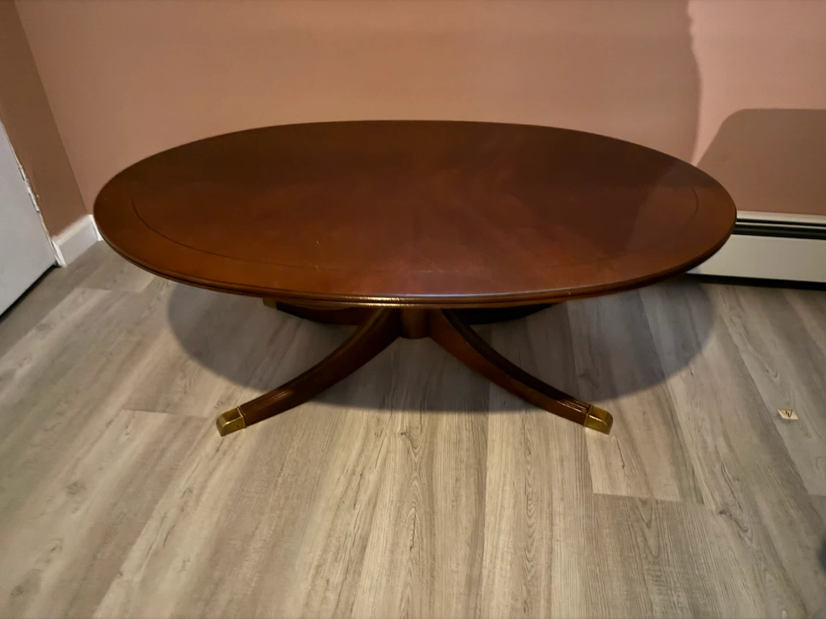 Oval Wood Coffee Table with Brass Accents