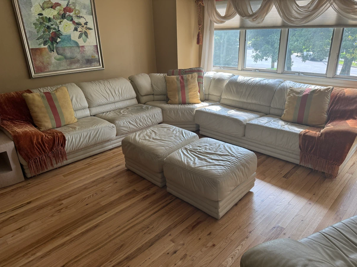 Cream Leather Sectional Sofa with Two Ottomans and Armchair