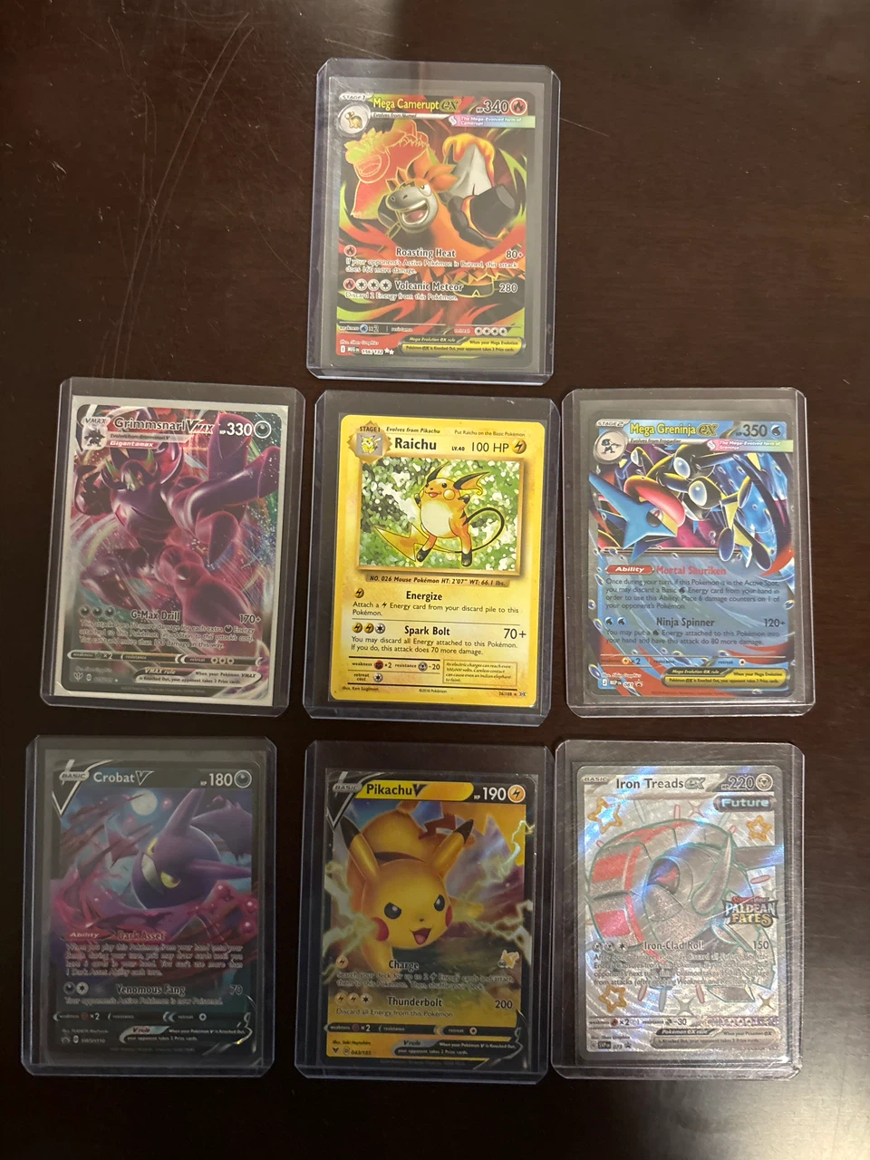 Set of 7 Pokemon Trading Cards with Protective Sleeves