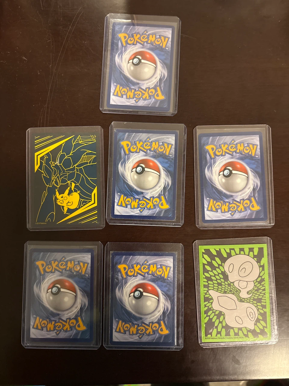 Set of 7 Pokemon Trading Cards with Protective Sleeves - photo 2