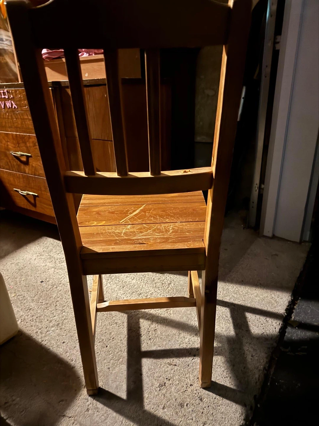 Solid wood dining chair with black seat