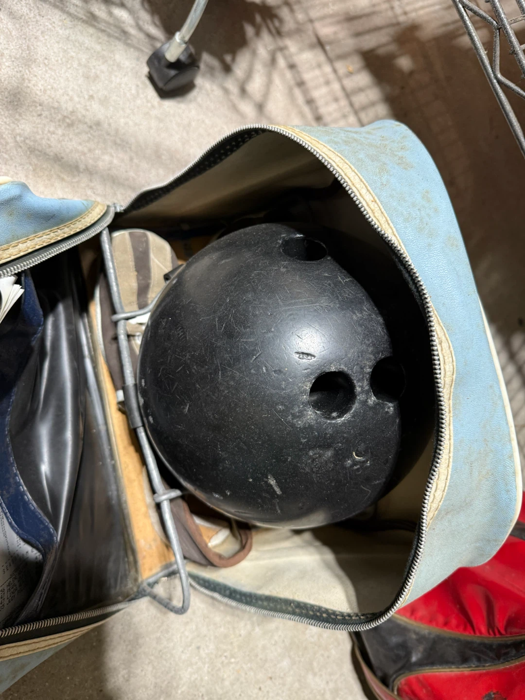 2 bowling balls in bags