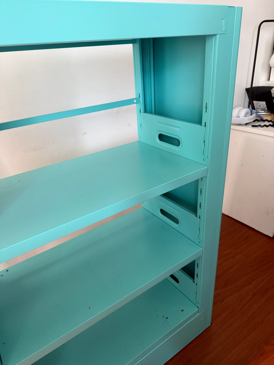 Turquoise metal shelving unit