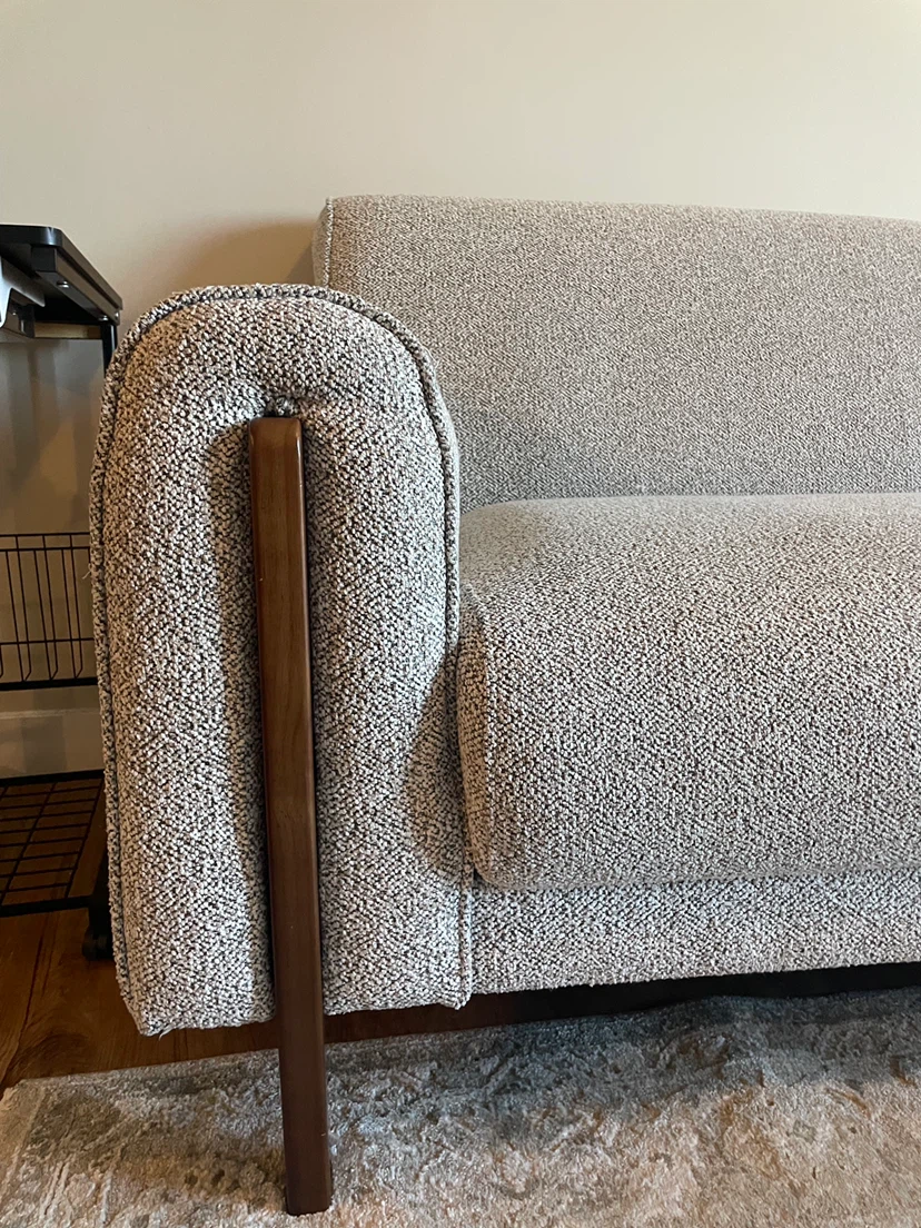 Grey sectional with accent wood