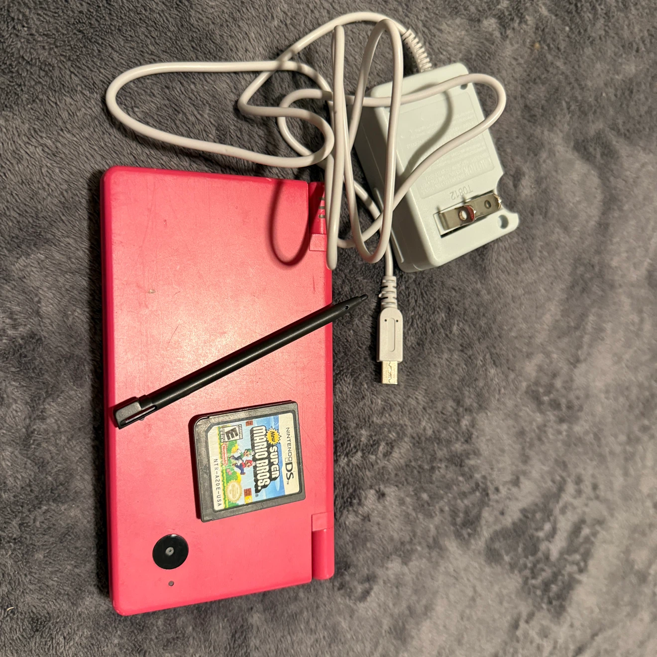 Nintendo DSi Red with New Super Mario Bros