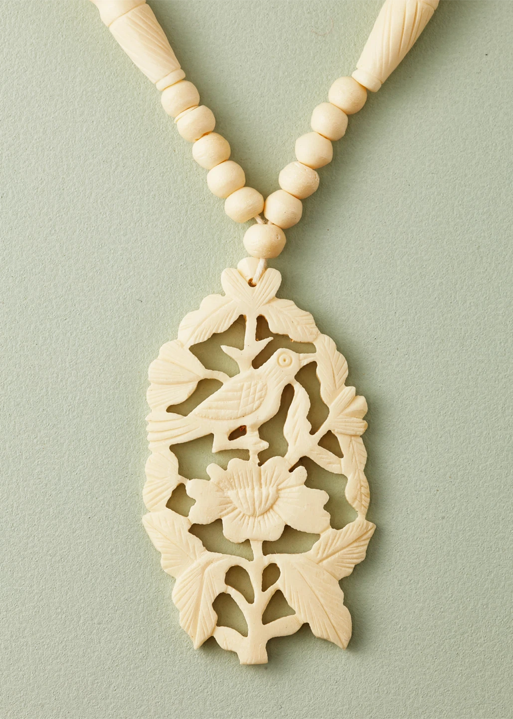 Vintage Carved Bovine Bone Bird and Flower Pendant Necklace