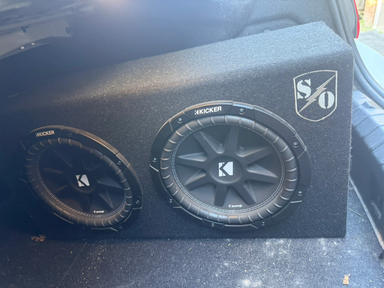 Kicker Subwoofer with Alpine Amp and Boss Capacitor