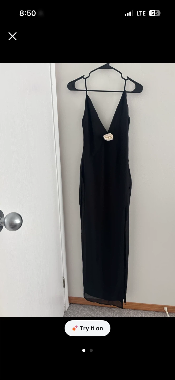Black sleeveless maxi dress with rose detail