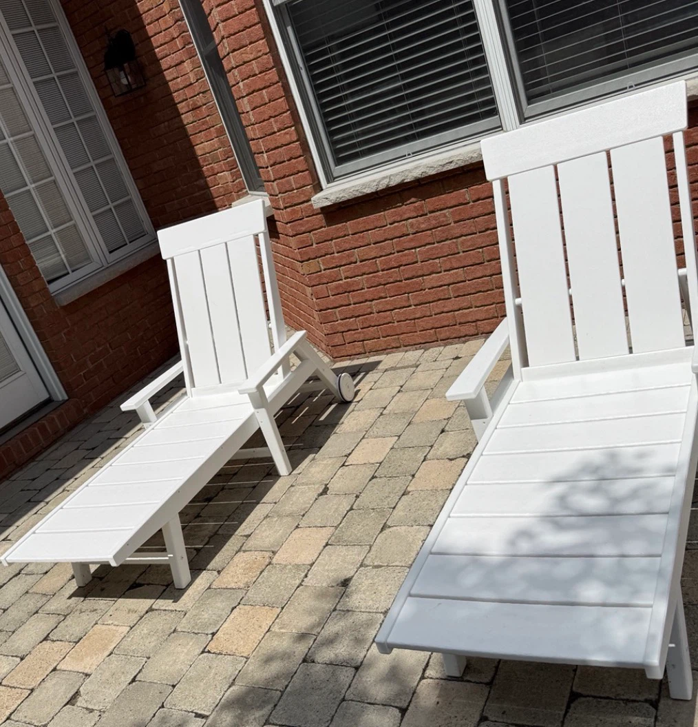 Two White polywood Outdoor Lounge Chairs