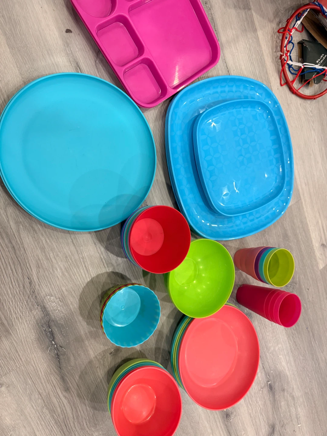 Assorted colourful plastic dinnerware set