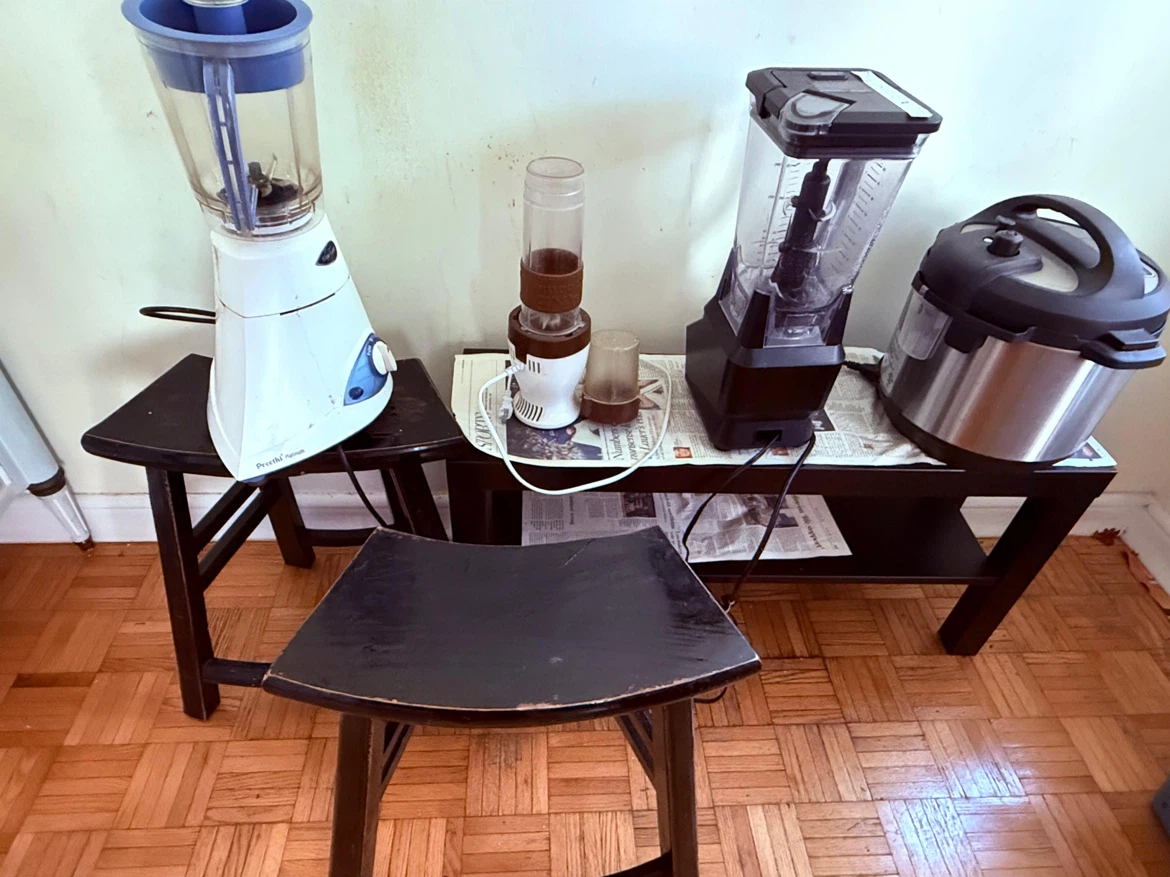 Black TV stand for sale - Adjacent small tables free