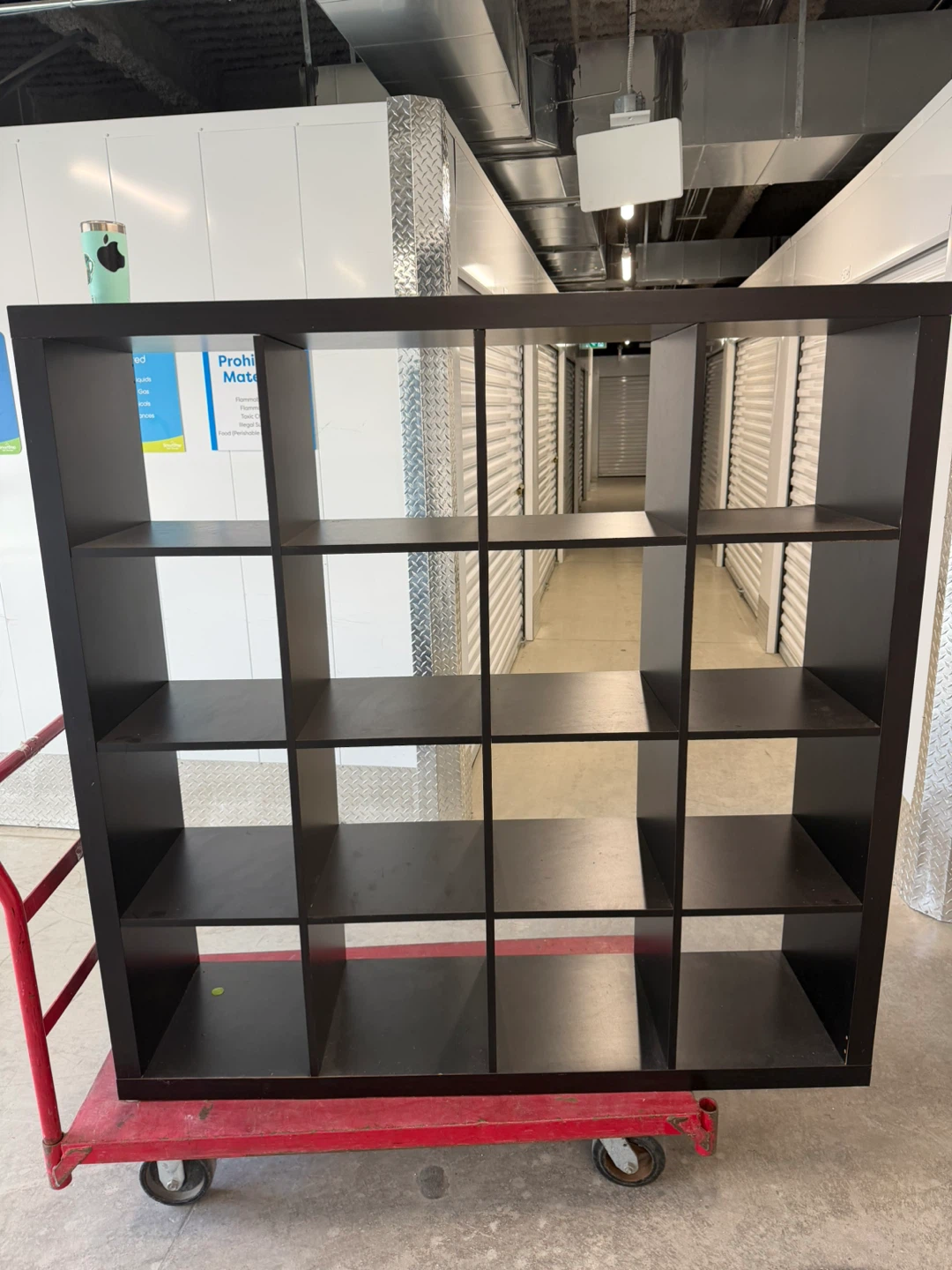 IKEA Kallax 16-Cube Shelving Unit has some wear