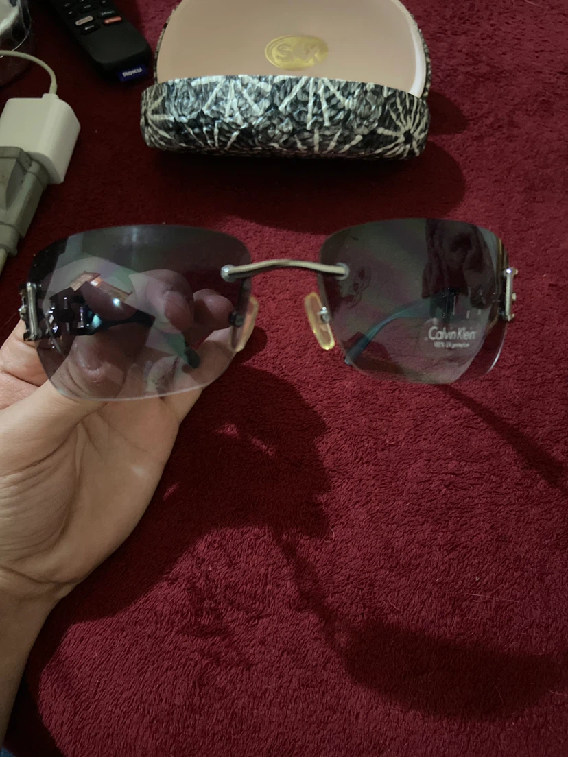 Calvin Klein Rimless Sunglasses