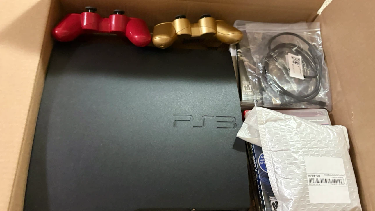 Sony PlayStation 3 Console with Controllers and Games