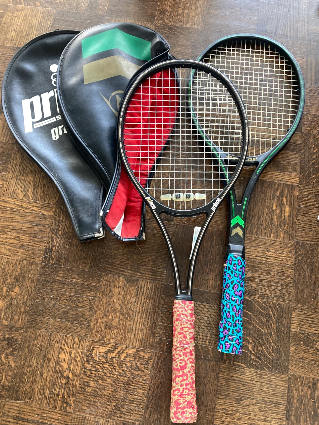 Two Tennis Rackets with Covers