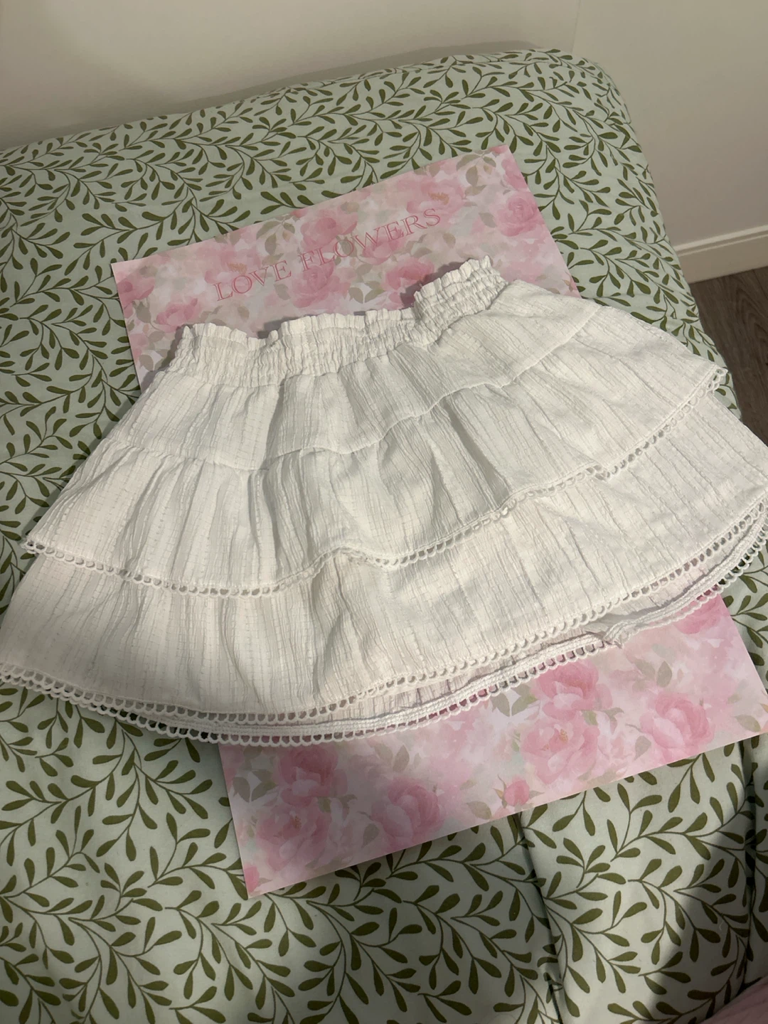 S White tiered ruffle skirt with thin shorts underneath
