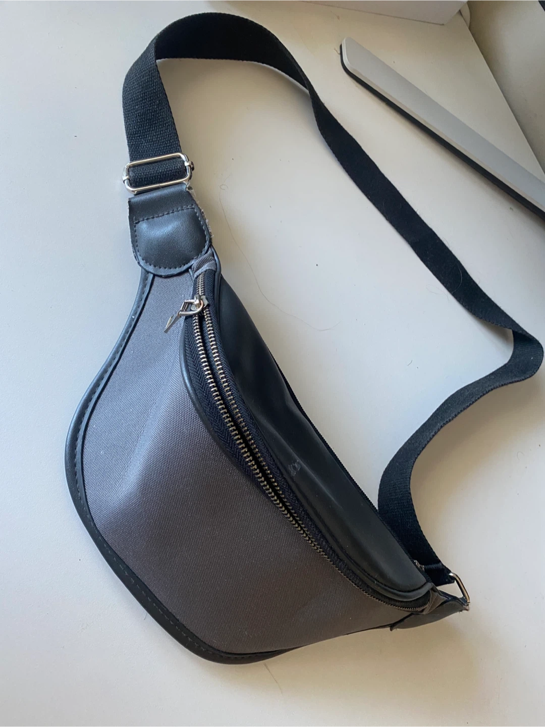 Grey and black waist bag