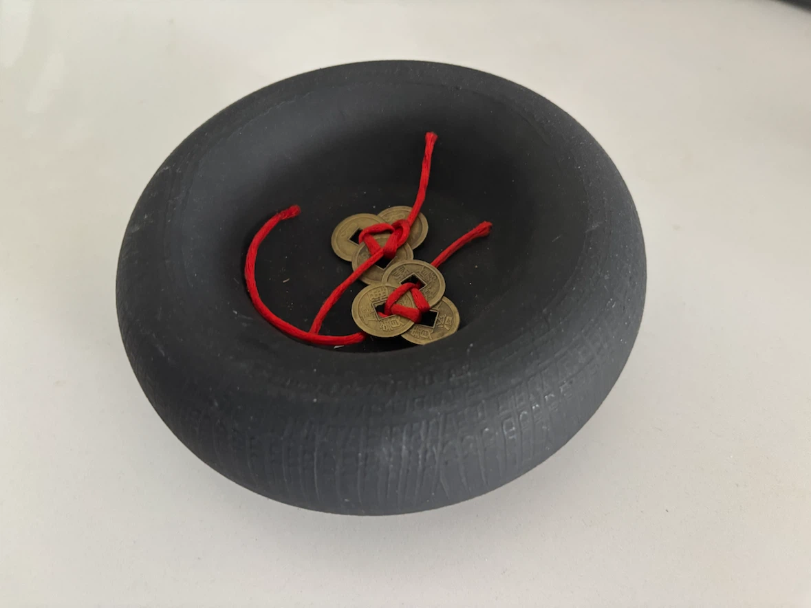 Black Stone Bowl with Decorative Coins