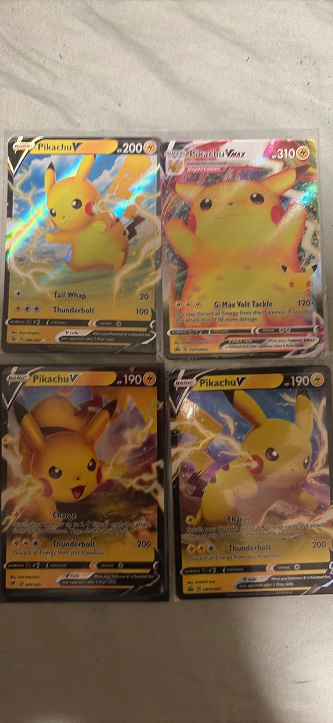Set of 4 older exquisite Pikachu cards.