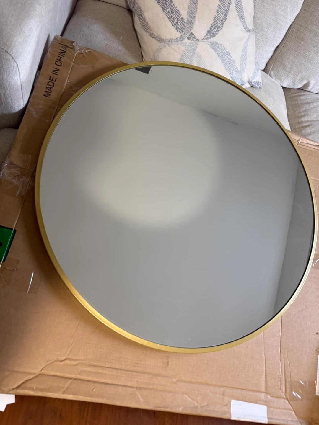 Round gold metal frame mirror