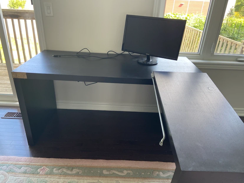 Black L-Shaped Desk and Two Blue Bar Stools