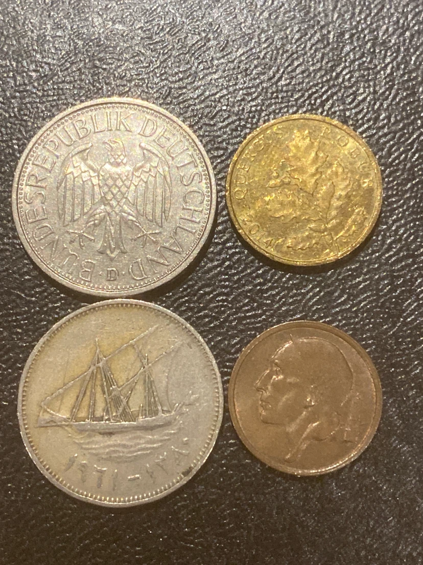 Assorted World Coins (4 Pieces)