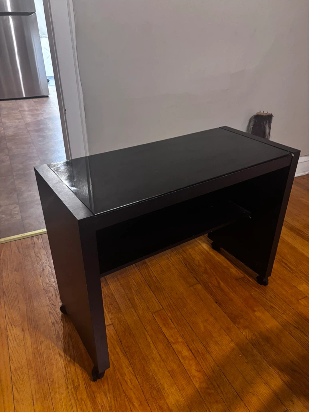 Black rolling desk