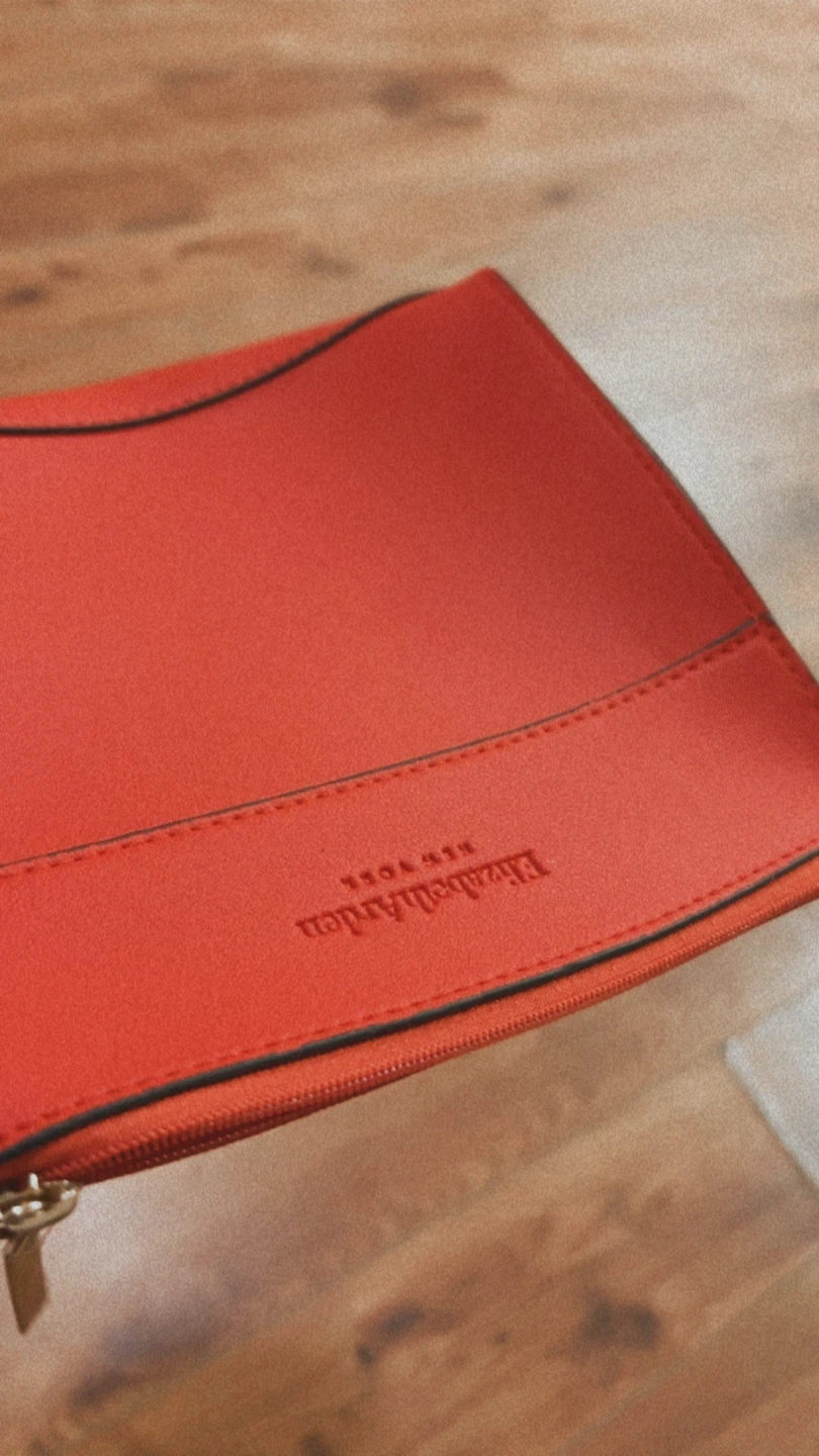 🏈 Elizabeth Arden orange cosmetic pouch