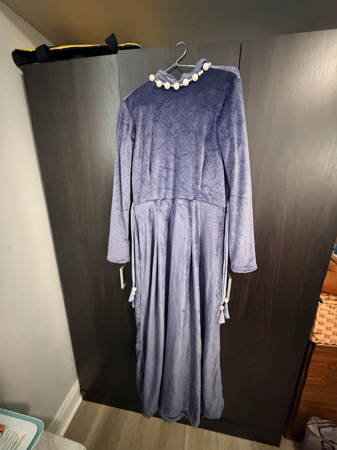 Blue velvet dress with pearl collar