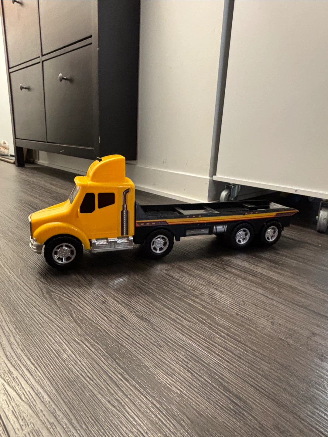 Yellow Toy Construction Flatbed Truck