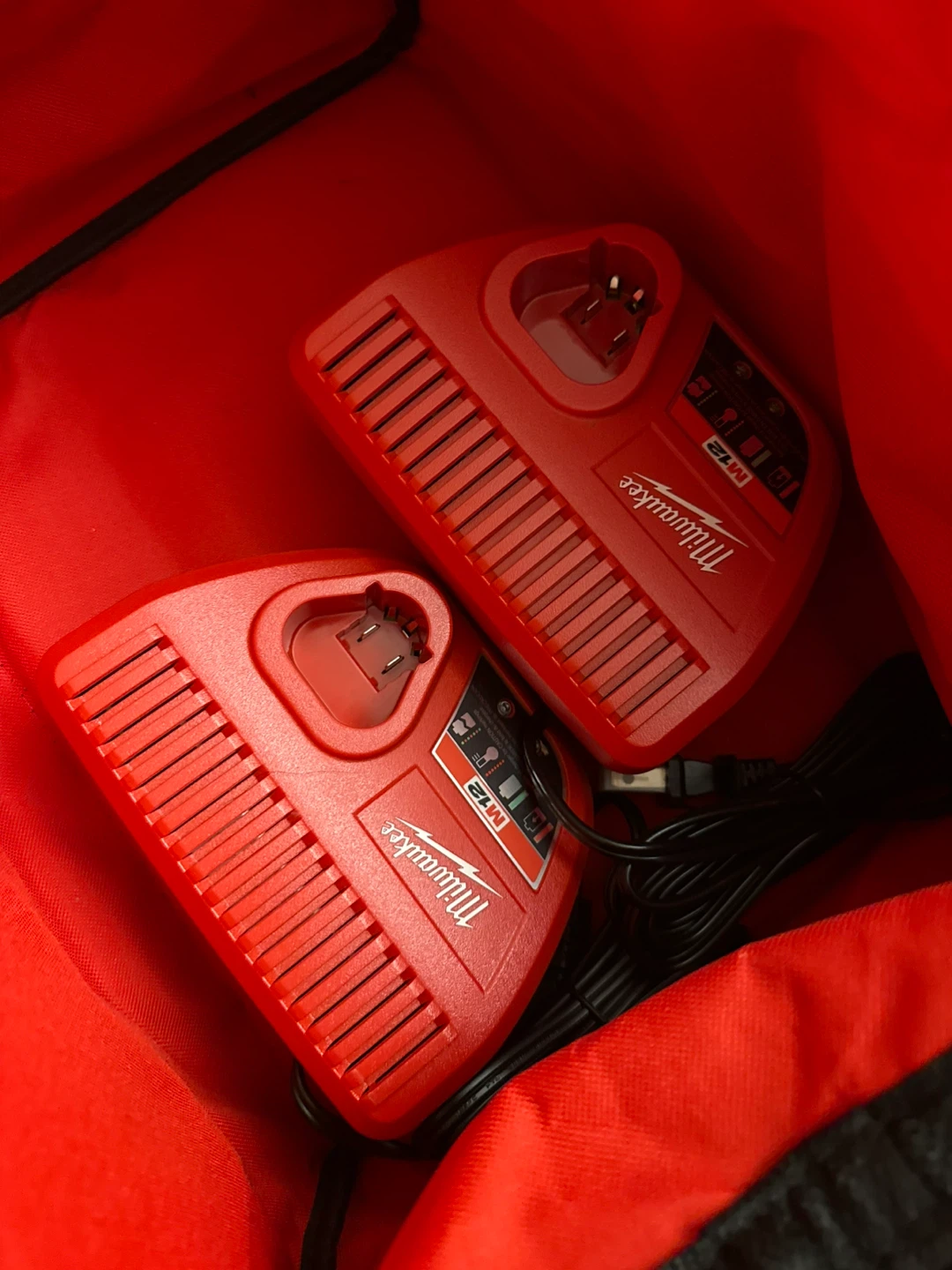 Two Milwaukee M12 Battery Chargers