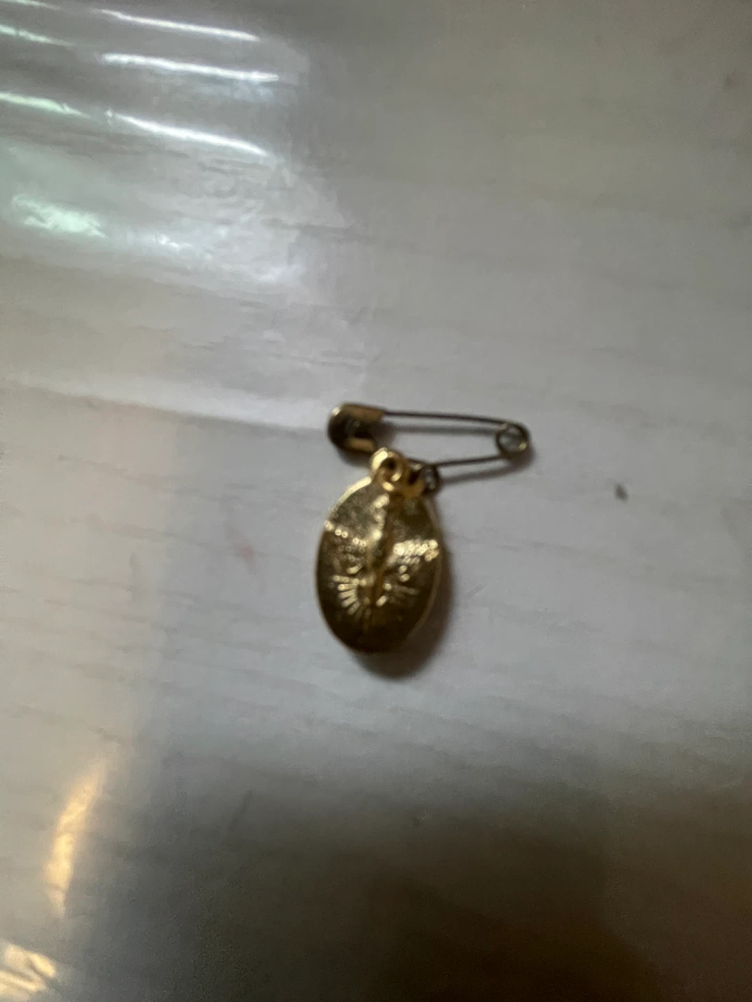 Gold-tone religious pin - photo 2