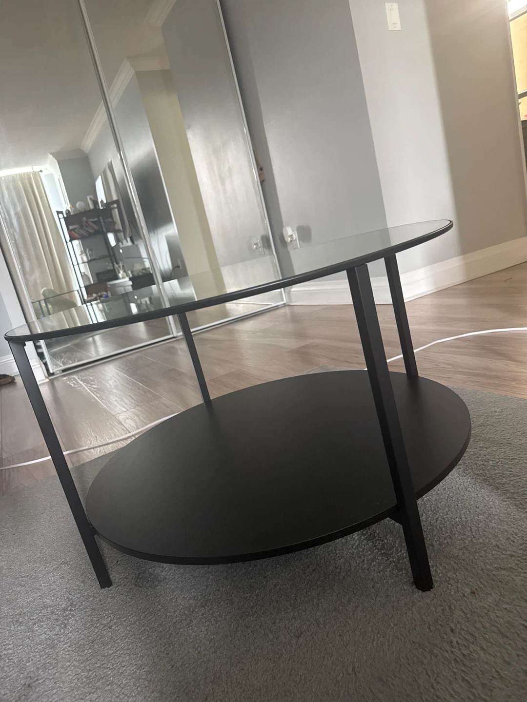 Round Glass and Black Metal Coffee Table - photo 2