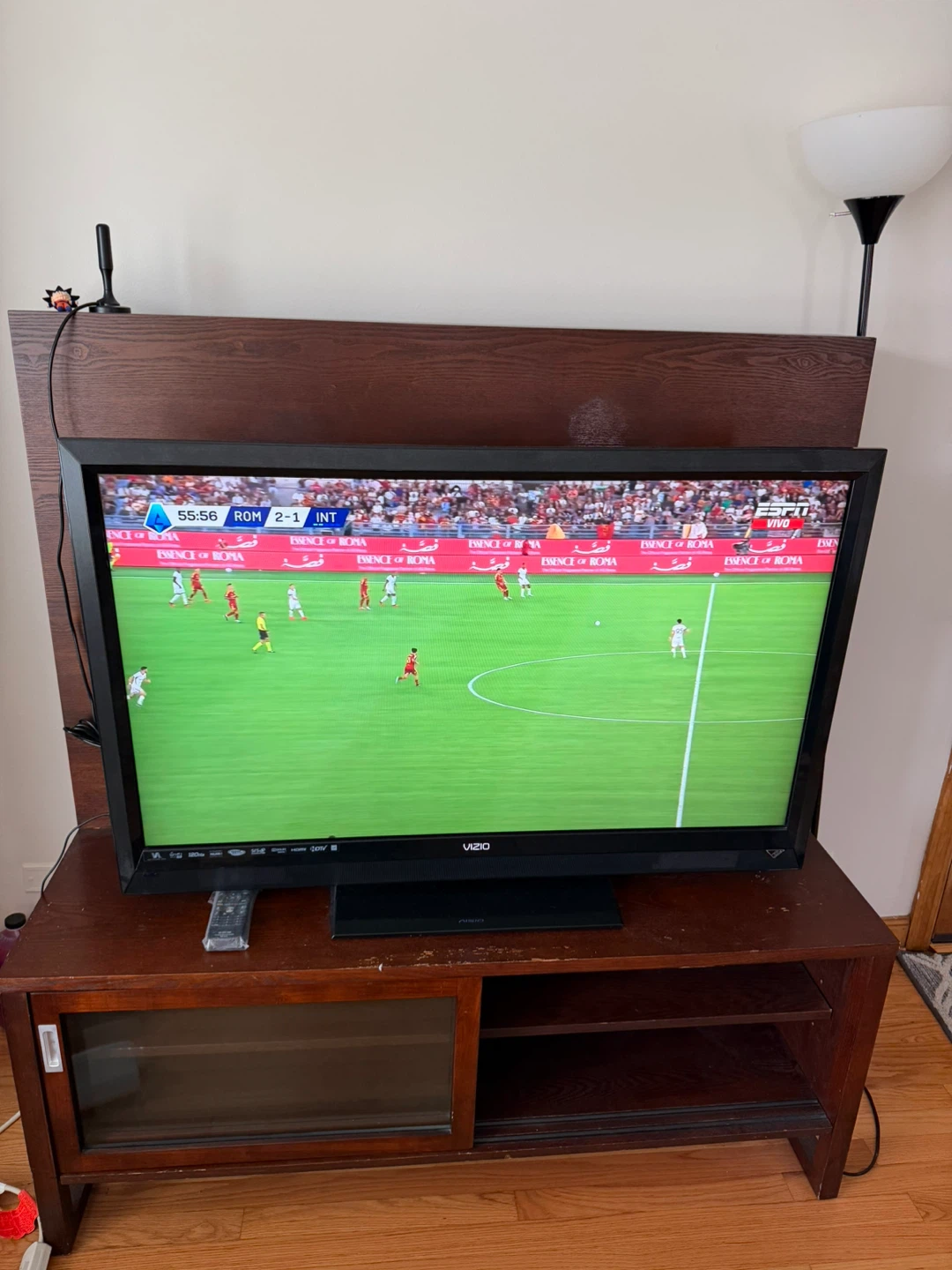 Dark Wood TV Stand with Integrated Shelf