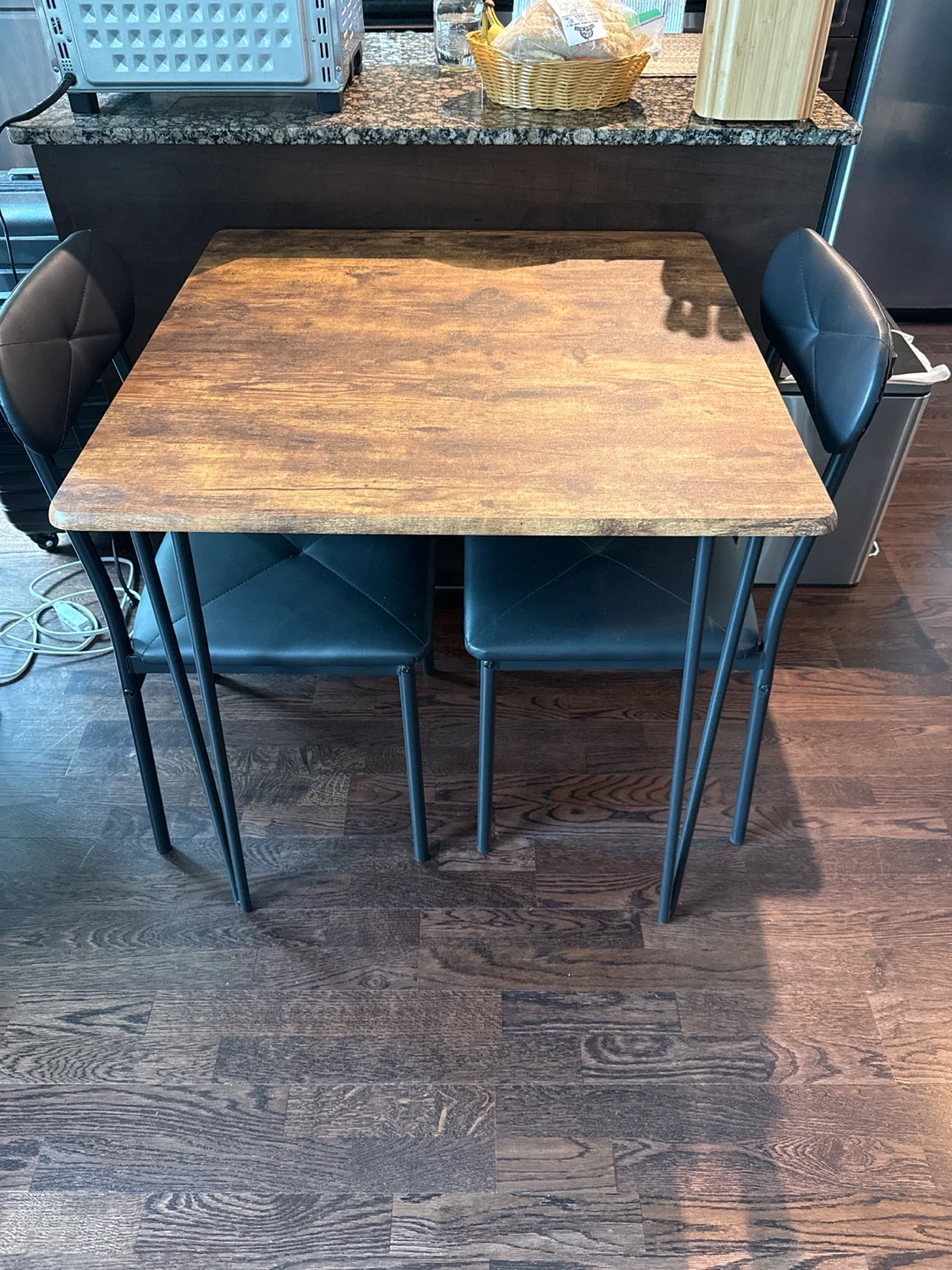 Dining table and two chairs set