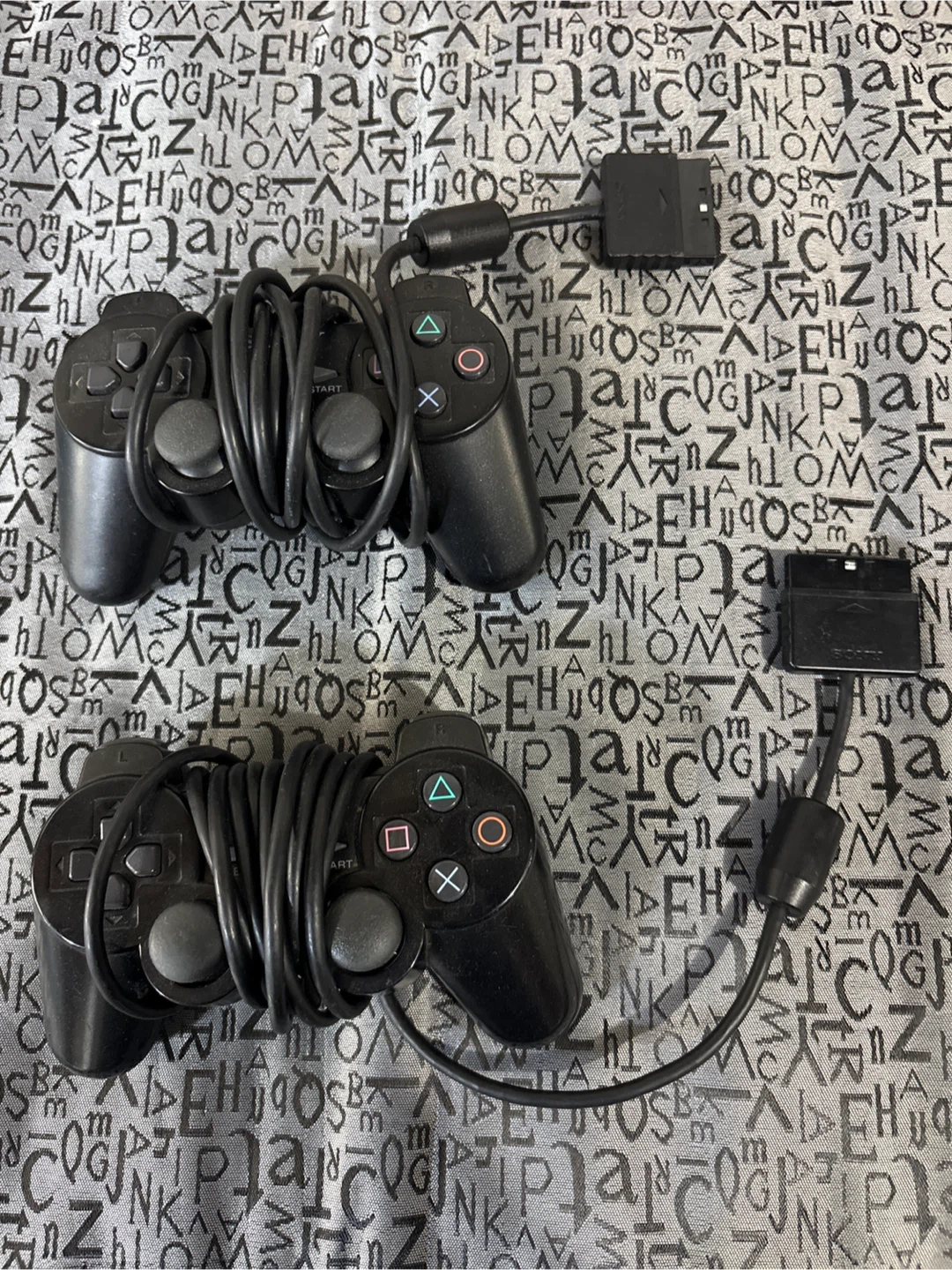 Two Sony PlayStation 2 Wired Controllers