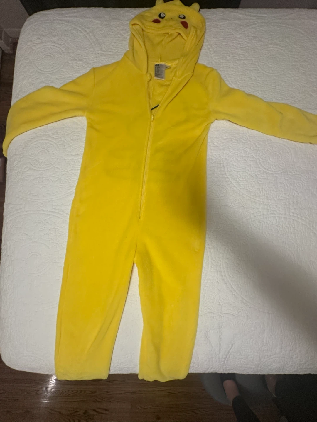 Pikachu onsie costume. Size 8-10 with pokeball candy bucket