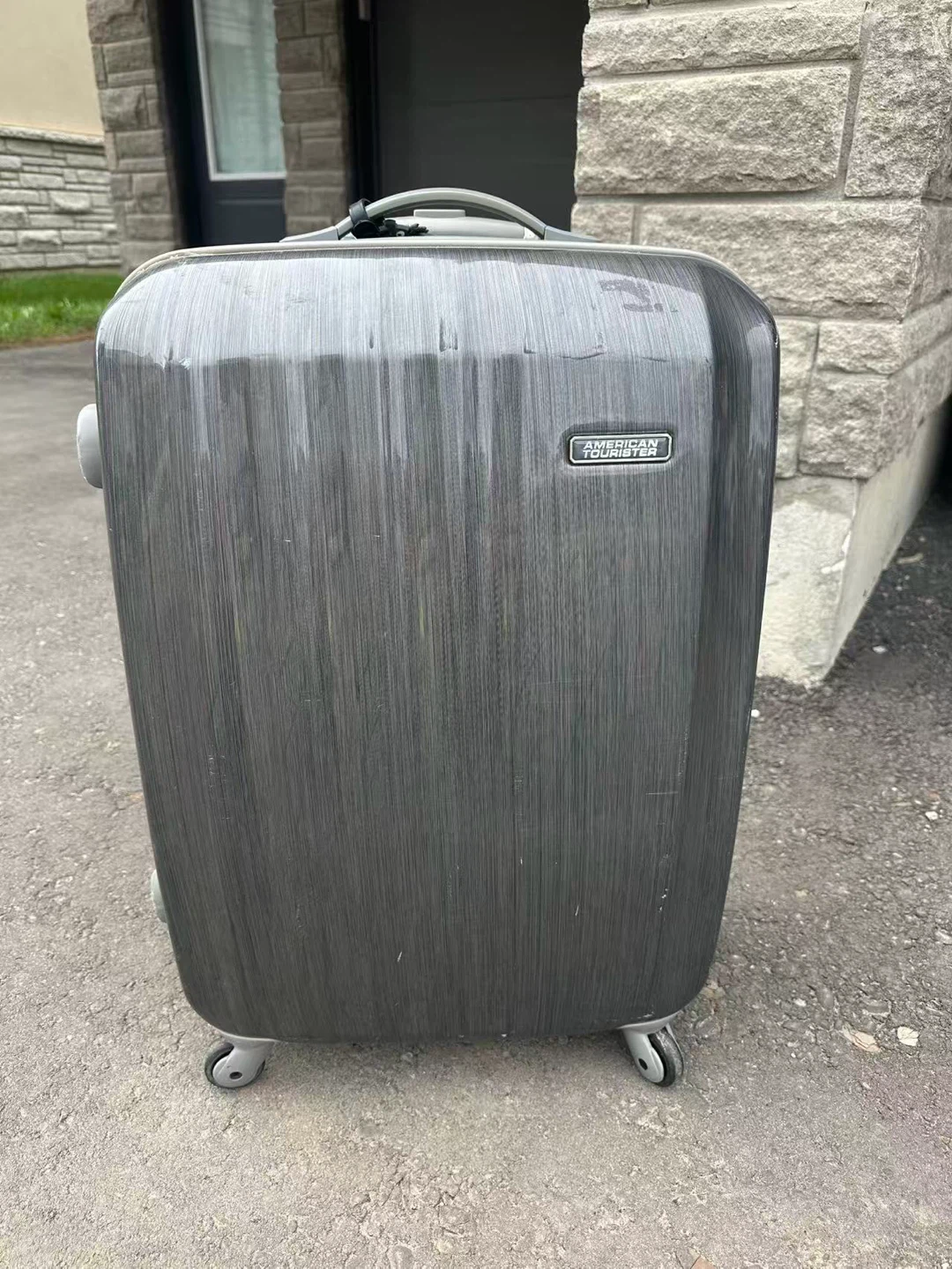 American Tourister hardside carry-on luggage