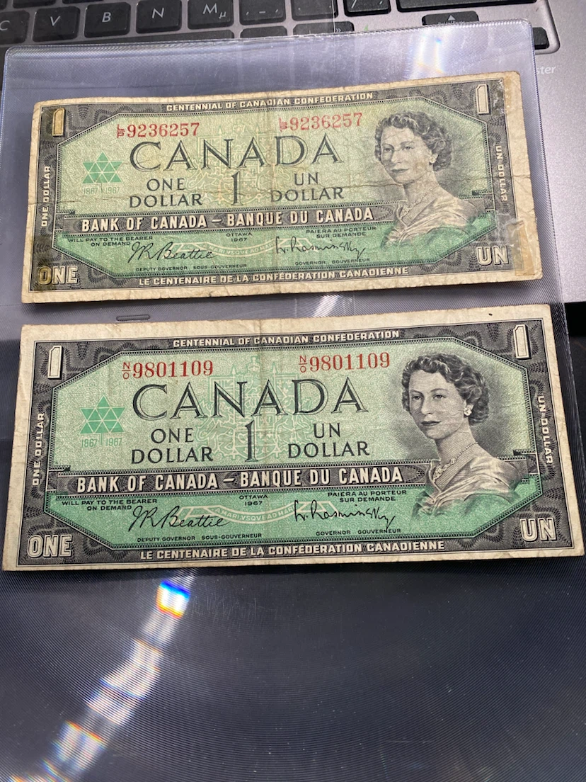 Two 1967 Centennial Canadian One Dollar Bills