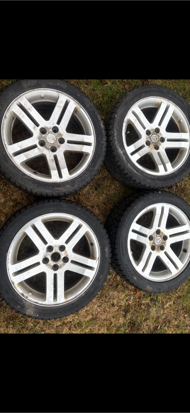 4 eighteen inch rims with snow tires