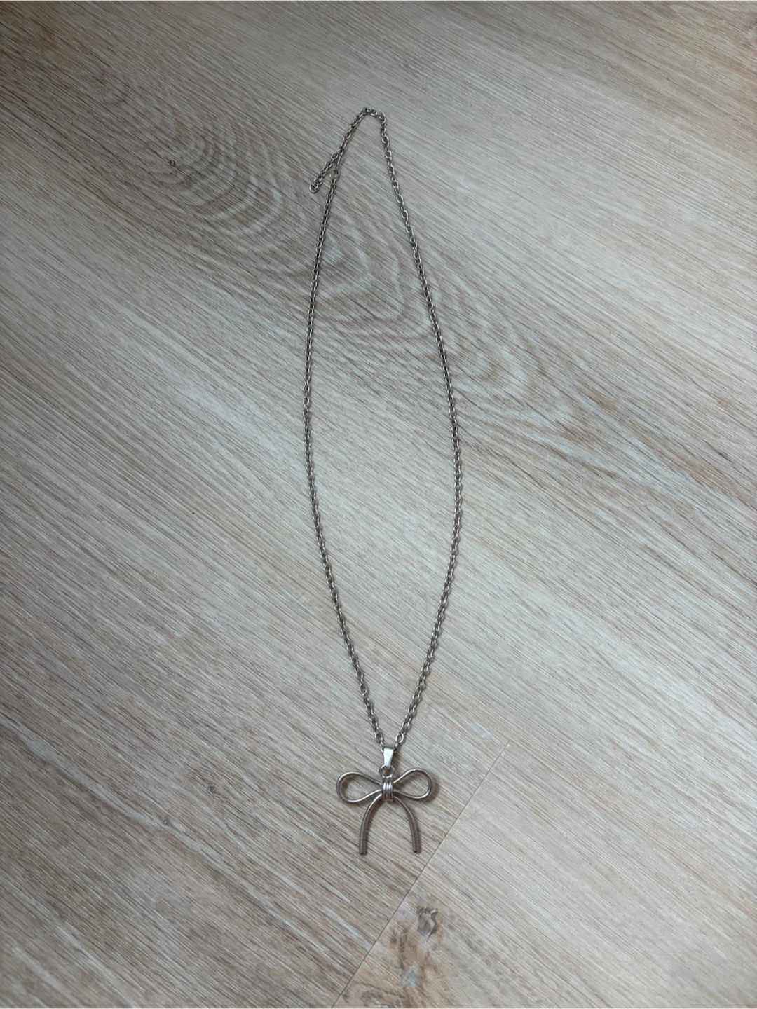 New Silver-Tone Bow Pendant Necklace