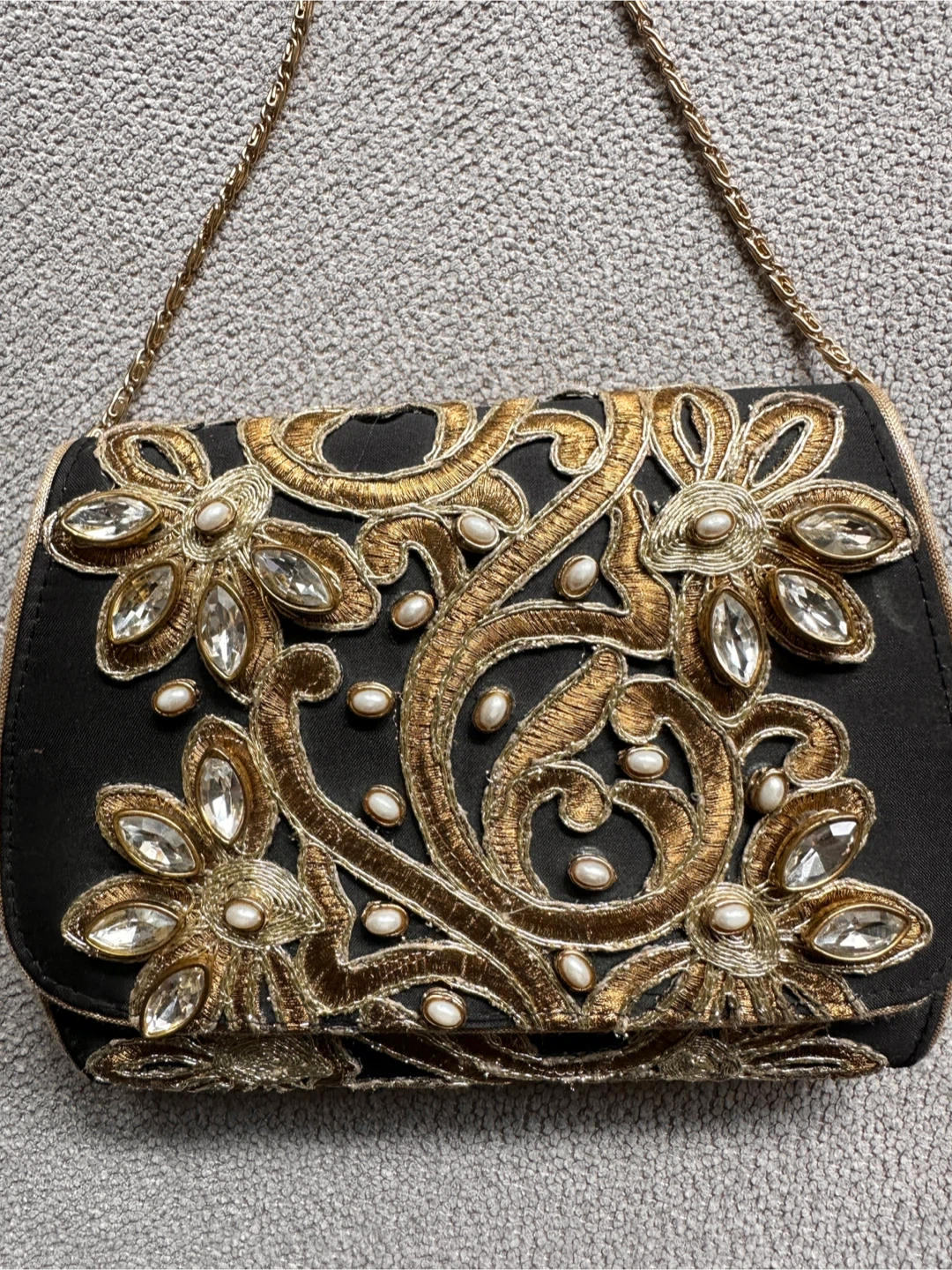 Black and gold embroidered clutch