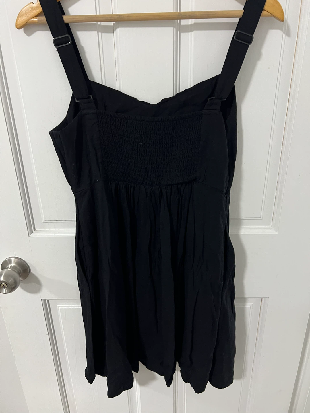 Black sleeveless mini dress
