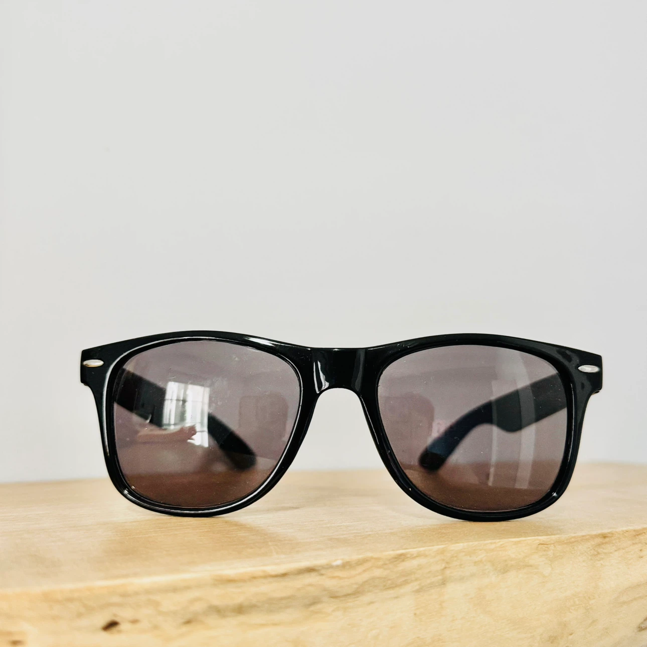 Classic black sunglasses 🏈