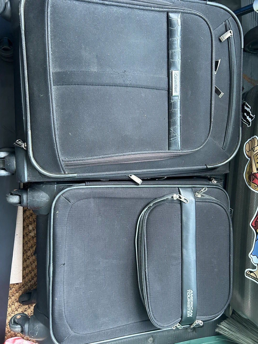 20" Calvin Klein and American Tourister. Suitcases