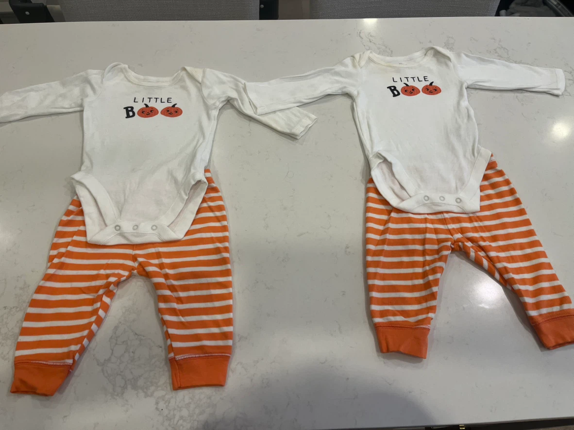 2 Baby  Halloween Outfits 6 each one has.  2 pieces