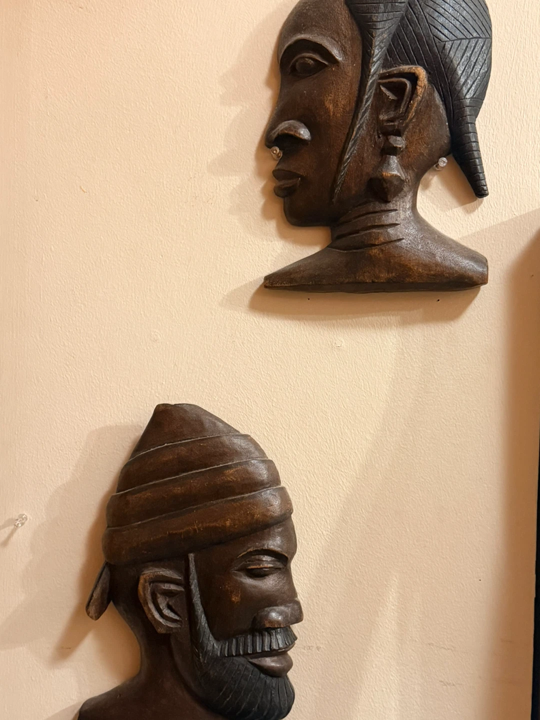 Two Hand-Carved Wooden Wall Masks